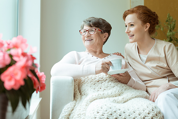 Two women sitting together visiting